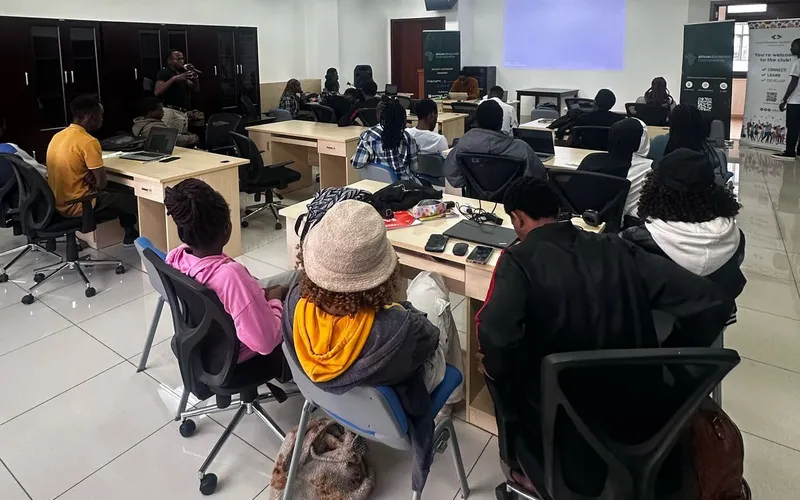 Developers working at laptops during an African Blockchain Championship session